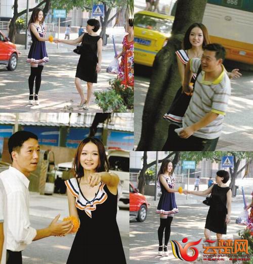 和美女握一次手就能拿走50元。你敢不敢去试试